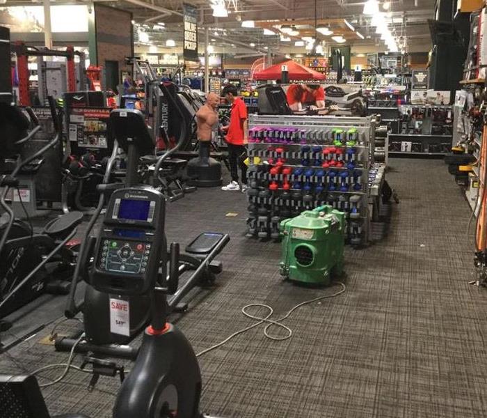 A sporting goods store is affected by a water loss